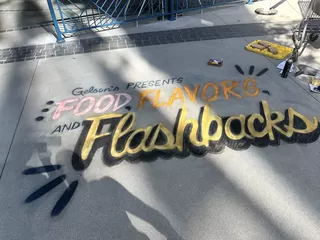 The event title in chalk art