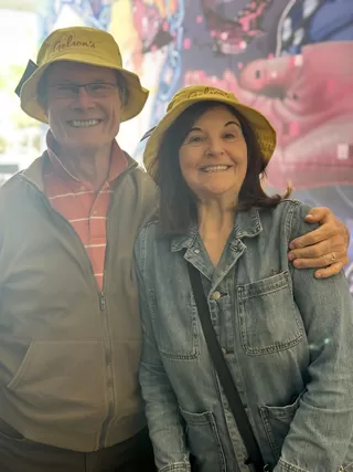 A couple of attendees in Gelson's event swag