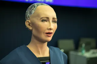 Sophia the AI robot speaks at a conference