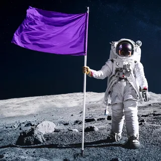 Astronaut stands on the moon holding a purple flag